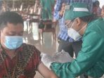 Ilustrasi pemberian vaksinasi covid-19 di wilayah Kabupaten Kutai Barat. 