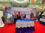 Perjanjian Kerjasama Antara BP Jamsostek Kantor Cabang Balikpapan Bersama IWAPI DPC Kota Balikpapan. Foto : Muhammad Eko