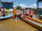 Banjir yang sempat merendam Kampung Mura Pahu dan dipantau langsung oleh Kapolsek Muara Pahu beberapa hari lalu kini diketahui sudah mulai surut. Foto : BorneoFlash.com/Lilis Suryani.