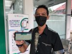 Bagus, Peserta JKN-KIS merasakan Manfaat Program Jaminan Kesehatan Nasional-Kartu Indonesia Sehat (JKN-KIS) Di Kabupaten Paser, Kalimantan Timur. Foto : HO.