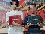Pelaku Pencurian Laptop Berinisial AG (25) dan LM (24) saat diamankan di Mapolsek Balikpapan Barat. Foto : BorneoFlash.com/Muhammad Eko.