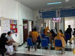 Suasana pelaksanaan vaksinasi Badan Intelijen Daerah (Binda) Kaltim di Puskesmas Senaken Kabupaten Paser, Jumat (10/12/2021). Foto : BorneoFlash.com/Fitriani.