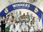Real Madrid sukses menaklukkan Liverpool pada laga final Liga Champions di Stade de France, Minggu (29/5/2022). Foto: AP/Manu Fernandez.