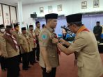 Bupati Paser dr Fahmi Fadli dikukuhkan sebagai Ketua Majelis Pembimbing Cabang (Mapicab) Gerakan Pramuka Kabupaten Paser, oleh Sekretaris Kwartir Daerah (Kwarda) Gerakan Pramuka Kaltim H Fachruddin Djaprie di Pendopo Kabupaten Paser, Senin (1/8/2022). Foto: HO/Humas pemkab Paser.