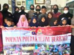 Polwan Bid Humas Bersama dengan ASN Polda Kaltim menggelar Bakti Sosial di beberapa Lembaga Kesejahteraan Sosial Anak (LKSA) di Kota Balikpapan, Jumat (2/9/2022). Foto: HO/Humas Polda Kaltim.