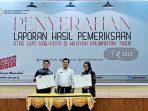 Ketua DPRD Kota Bontang, Andi Faizal Sofyan Hasdam dan Wakil Wali Kota Bontang, Hj.Najirah. HD menerima laporan hasil pemeriksaan BPK, di Auditorium Kantor Badan Pemeriksa Keuangan Republik Indonesia Perwakilan Provinsi Kalimantan Timur di Kota Samarinda, pada hari Rabu (10/5/2023).(Foto:BorneoFlash.com/ist).