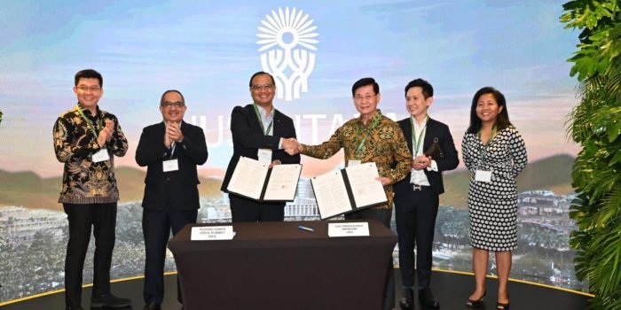 OIKN menandatangani Non Disclosure Agreement (NDA) dengan State Power Investment Corporation (SPIC) dan JOE Green Pte Ltd. pada agenda Ecosperity Week 2023, di Marina Bay Sands Expo and Convention Hall, Singapura, Kamis (8/6/2023). Foto: BorneoFlash.com/I