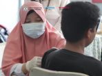 Pelaksanaan vaksinasi DBD di SD wilayah Balikpapan Utara. Foto: BorneoFlash.com/Ist.