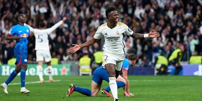 Vinicius Junior menjebol gawang RB Leipzig, Real Madrid lolos ke babak perempatfinal Liga Champions usai laga berakhir 1-1. Foto: IST/Angel Martinez/Getty Images