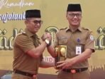 Wali Kota Balikpapan H. Rahmad Mas'ud saat menerima ketiga piala, di Halaman BSCC DOME pada hari Minggu, 10 Maret 2024.