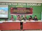 Kasat Binmas Polres PPU, AKP  Bambang Purnomo mengikuti kegiatan sosialisasi, di Gedung Serba Guna Desa Sidorejo Kabupaten Penajam Paser Utara, pada hari Jumat, (14/06/2024). Foto: HO/Humas Polda Kaltim