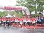 Memeriahkan Hari Bhayangkara Polda Kaltim menggelar acara Bhayangkara Run 2024 yang menempuh jarak 5,78 km di Grand City Balikpapan, pada Minggu (7/7/2024). Foto: HO/Humas Polda Kaltim