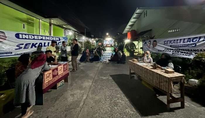 Polres Bontang monitoring dan pengamanan kampanye di Jalan Emerald Rt 20/28, Kelurahan Berbas Tengah, Kecamatan Bontang Selatan, pada hari Minggu (13/10/2024). Foto: HO/Humas Polres Bontang