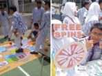 Suasana game ular tangga yang diselenggarakan PIK-Remaja dan keseruan para peserta saat mengikuti squid game. Foto: Siswa SMAN3/Dimas Andrean