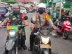 Personel TNI dan Polri aktif menggelar berbagai kegiatan untuk memastikan ketertiban di lingkungan warga. Foto: BorneoFlash/Ist