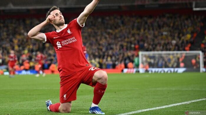 Pemain Liverpool dengan kebangsaan Portugal, Diogo Jota, dengan posisi sebagai penyerang di lapangan. Foto: ANTARA/AFP/Oli Scarff