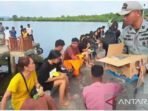 Bakamla saat mengevakuasi korban kebakaran KM Barcelona dari Talaud ke Manado yang terbakar di Perairan Talise, Likupang, Minut, Sulut, Minggu (20/7/2025). Foto: ANTARA/Bakamla.