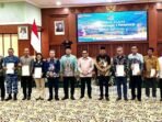 Acara Sosialisasi Pengadministrasian & Pendaftaran Tanah Ulayat di Gedung K.H. Idham Chalid, Komplek Kantor Gubernur Kalimantan Selatan, pada Kamis (31/7/2025). Foto: HO/PLN UIP KLT