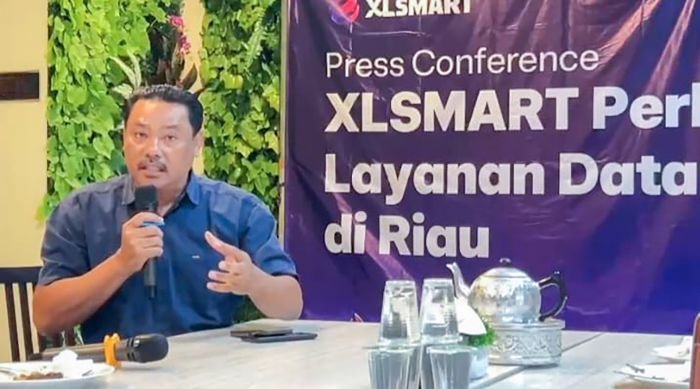 Head of Sales XLSMART West Central 1, Oloan Monang Sinambela saat press conference bersama media di Kota Pekanbaru, pada Selasa (12/8/2025). Foto: HO/ XLSMART