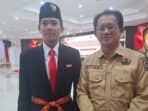 Muhammad Aqqil Waliyyuddin, Ketua DPPI Kota Balikpapan periode 2025–2029 bersama Kesbangpol Kota Balikpapan, Sutadi. Foto: BorneoFlash/Niken Sulastri