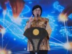 Deputi Gubernur Senior Bank Indonesia (BI) Destry Damayanti menyampaikan sambutan pada acara penandatanganan Perjanjian Induk Derivatif Antarbank sekaligus peluncuran Matchmaking Overnight Index Swap (OIS), di Jakarta (26/9/2025). Foto: ANTARA/HO-Bank Indonesia