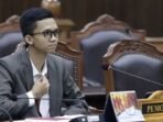 Muhamad Anugrah Firmansyah, pemohon uji materi Undang-Undang Nomor 1 Tahun 1974 tentang Perkawinan, mengikuti sidang perdana di Mahkamah Konstitusi, Jakarta, Rabu (12/11/2025). FOTO : ANTARA/HO-Humas MK/Bay
