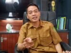 Plt Kepala Dinas Tenaga Kerja dan Transmigrasi Kutim, Trisno. Foto: HO/kutaitimurkab.go.id