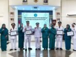 Camat Balikpapan Utara, Umar Adi bersama enam lurah Camat Balikpapan Utara, Umar Adi bersama enam lurah usai launching program tematik kelurahan usai pelantikan kepengurusan Tim Penggerak Pemberdayaan Kesejahteraan Keluarga (TP-PKK) tingkat kecamatan dan kelurahan, pada Sabtu (31/1/2026). Foto: BorneoFlash/Ist