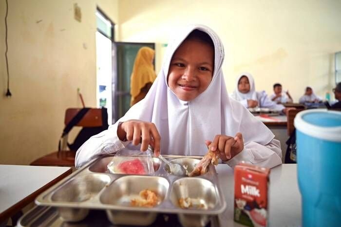 Ilustrasi siswa sedang konsumsi Makan Bergizi Gratis (MBG).FOTO: Dokumen Kemendikdasmen