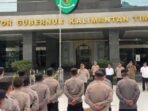Sat Brimob Polda Kaltim menurunkan satu SSK personel Batalyon B Pelopor untuk melaksanakan pengamanan aksi unjuk rasa di kawasan Kantor Gubernur Kaltim, Jalan Gajah Mada, Samarinda, pada Senin (23/02/26). Foto: HO//Humas Polda Kaltim