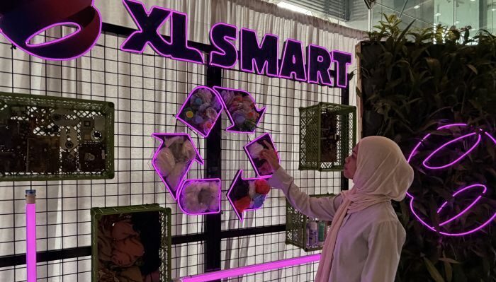 XLSMART berhasil meraih Entity Rating “2” dengan skor 67 dari Sustainable Fitch. Foto: HO/XLSMART